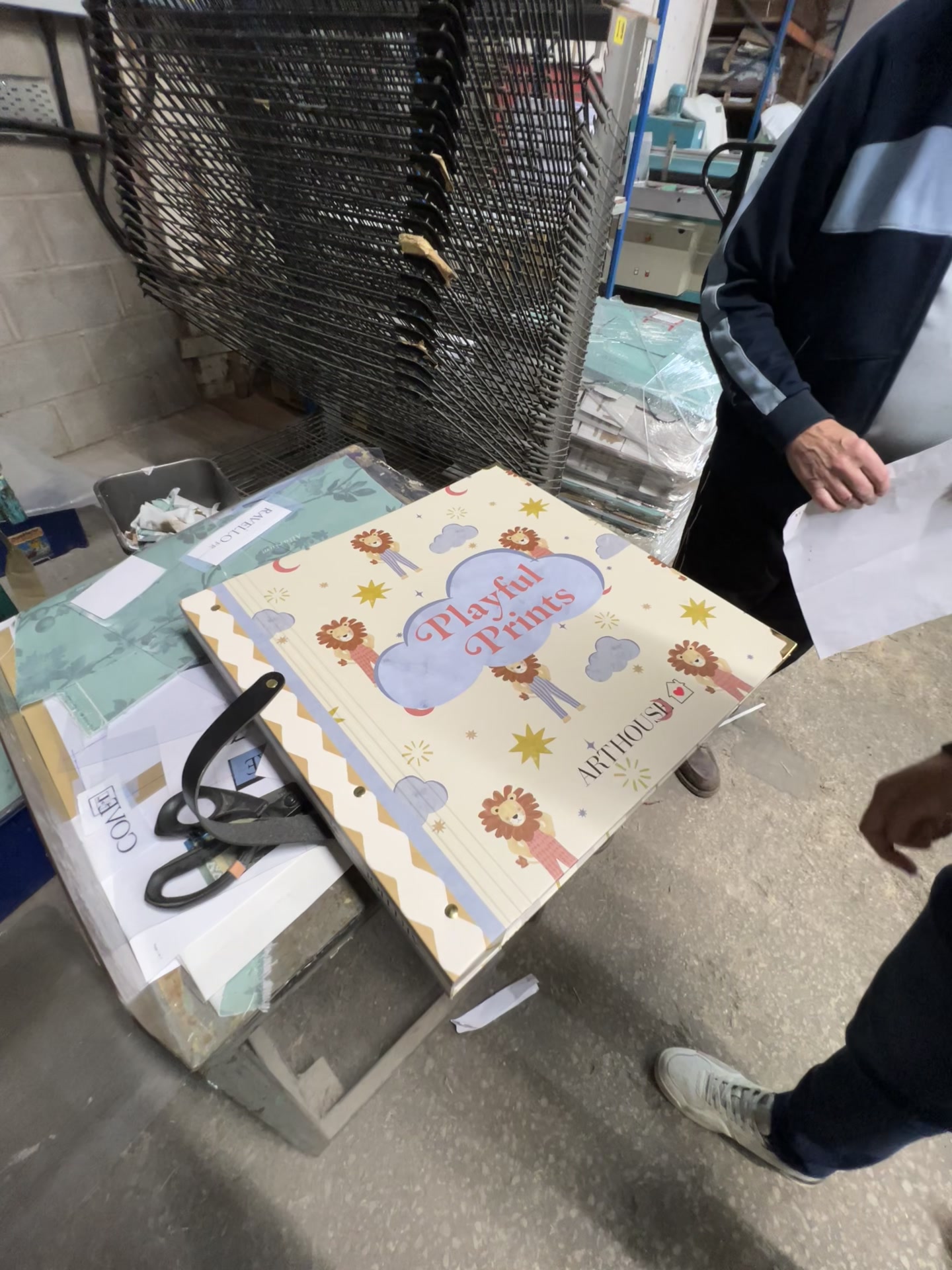 Finished Arthouse Playful Prints wallpaper sample book on a trolley in the Oldham workshop